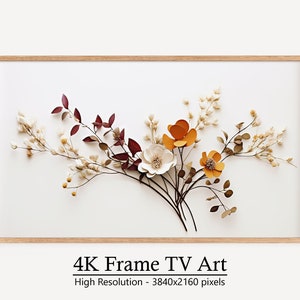 Puede incluir: Una impresión enmarcada de un arreglo floral con flores secas en tonos de blanco, beige, marrón y rojo. Las flores están dispuestas en un ramo y se colocan sobre un fondo blanco. El marco es de madera y tiene un acabado natural. El texto "4K Frame TV Art" y "High Resolution - 3840x2160 pixels" está impreso debajo de la imagen.