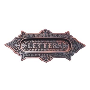 Placa decorativa de latão "Cherethims" da Shristy Hardware