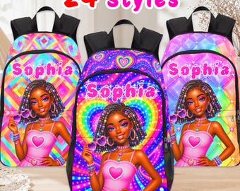 May include: Three backpacks featuring a vibrant, rainbow-colored graphic of a person with braided hair, wearing a pink top with a heart design. The name Sophia is printed in pink above the character. The text 24 Styles appears at the top.