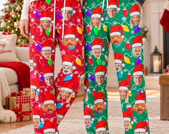 May include: Two pairs of lounge pants featuring a repeating Christmas pattern with colorful light bulbs, snowflakes, and custom faces of people and pets wearing Santa hats. One pair is red and the other is green, both with white drawstrings.