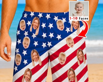May include: Swim trunks featuring a blue field with white stars and red and white stripes, customized with a repeating pattern of baby and adult faces. The design includes text stating 6 Styles and 1-10 Faces with an arrow pointing to the shorts.