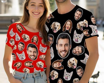 May include: A red short-sleeve t-shirt and a black short-sleeve t-shirt, both featuring an all-over repeating pattern of various human faces, a golden retriever dog, and a cat. The designs include multiple portraits of the same individuals.