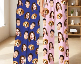 May include: Two pairs of pajama trousers, one blue and one pink, featuring a repeating pattern of smiling faces and a beagle's face. The trousers are made of a soft material and have a relaxed fit. The blue trousers are on the left, and the pink trousers are on the right.