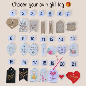 May include: Twenty-one different gift tags with various designs and messages. The tags are made of paper and have a variety of colors and patterns. Some of the tags have a heart shape, while others are rectangular. The tags are numbered 1 through 21.