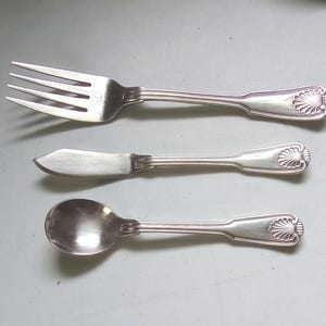 Vintage Rogers shell pattern, meat fork, butter knife, sugar spoon