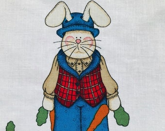 May include: A white rabbit wearing a blue hat, red and black plaid vest, and blue pants holds two carrots. The rabbit is standing in a field with green carrot tops.