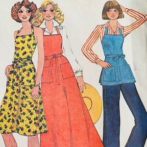 May include: A vintage sewing pattern featuring three different styles of dresses with an apron design. The dresses are in red, blue, and yellow floral print. The pattern includes instructions for making the dresses.