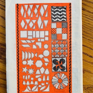 May include: A red and black multi-stamp transfer sheet with a variety of geometric shapes and patterns. The sheet is labeled "Design 770 Multi-Stamp Transfer".
