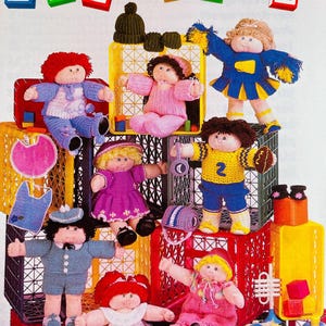May include: A vintage image featuring handmade soft sculpture dolls, each with unique outfits and hairstyles. The dolls are arranged on and around colorful plastic crates, with the word "PLAYTIME" spelled out in block letters above. The phrase "soft sculpture" is also visible.