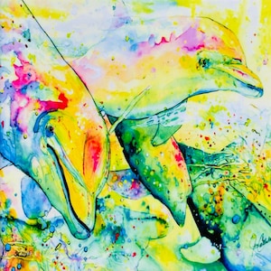 May include: A watercolor painting of two dolphins swimming in a vibrant, colorful ocean. The dolphins are painted in shades of yellow, pink, and blue, with splashes of green and purple throughout the painting.