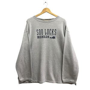 May include: Gray long-sleeve sweatshirt with the text "Soo Locks Michigan" and a small graphic of a ship.