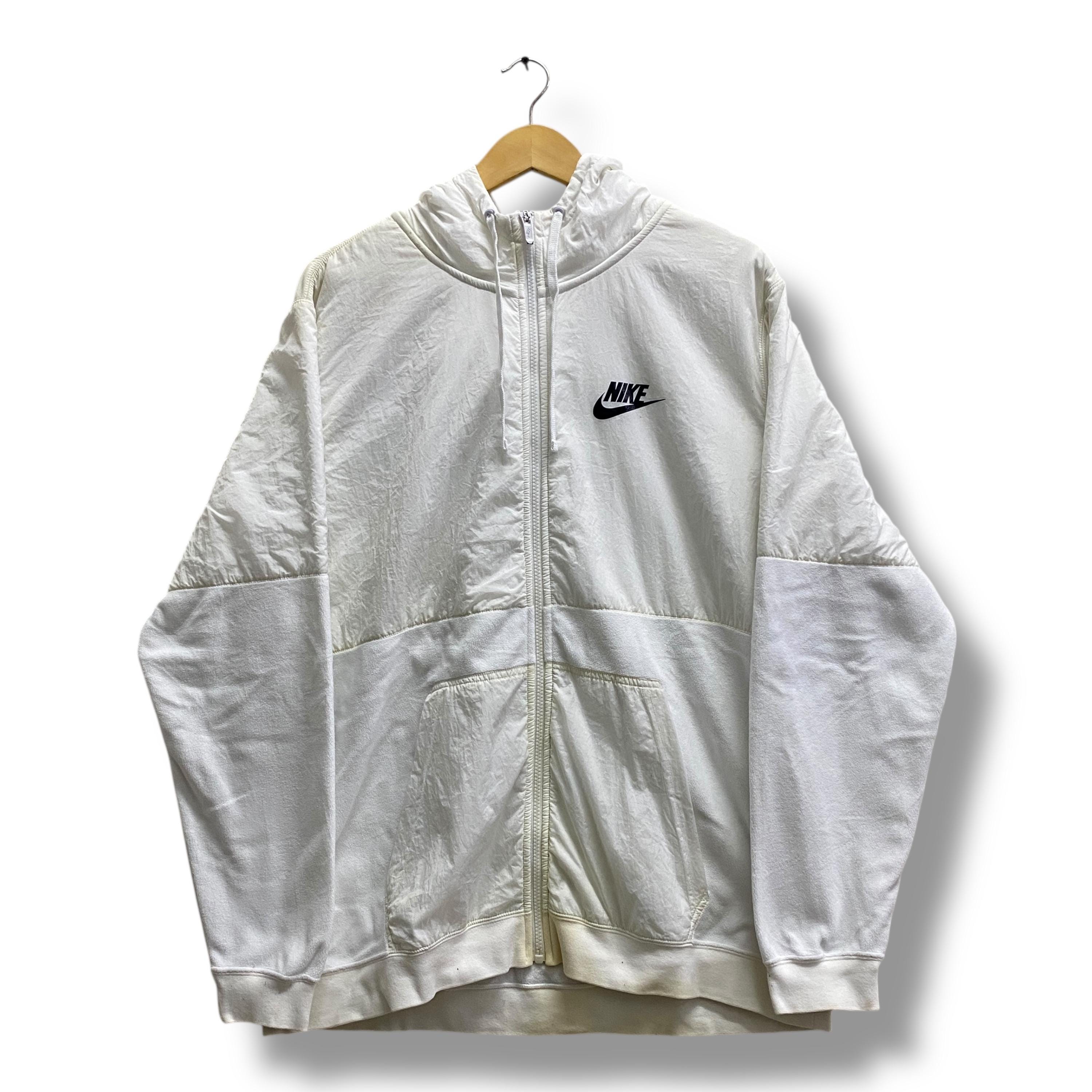 white and grey nike jacket