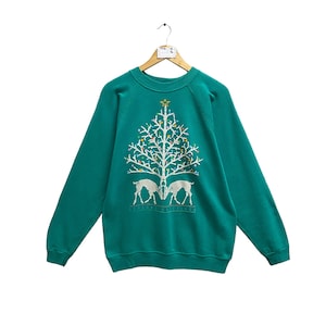 Vintage des années 90 salutations des saisons vert sweat taille grand arbre de Noël ras du cou cerf faune imprimé animal logo arbre de Noël cerf pull