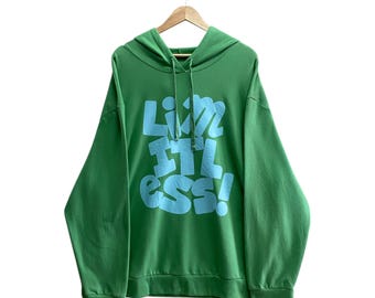 Sudadera holgada con capucha y gráfico verde sin límites Y2K vintage, talla extragrande, cuello redondo, estampado de logotipo y hechizos.