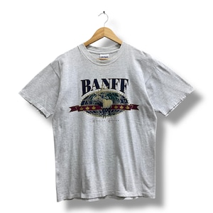 Camiseta vintage cinza macia Banff Alberta Canadá dos anos 90, tamanho grande, gola redonda, suéter de veado com cauda branca, suéter com estampa de logotipo, camiseta de veado
