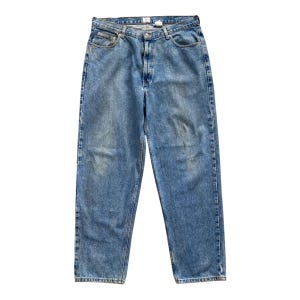 Jeansy Calvin Klein Light Blue z lat 90. W35 Calvin Klein Zipper Fly Calvin Klein Baggy Wide Fit Tapered Legs Calvin Klein High Waist