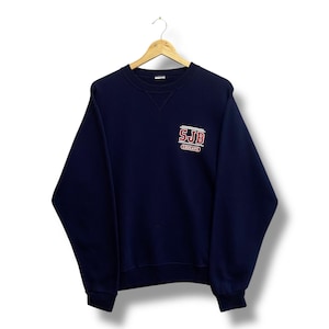 Vintage 90-tals Russell Athletic svart tröja MEDIUM SJB Cougars rund hals SJB Cougars tröja pullover streetwear tryck logotyp Russell jumper