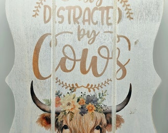 Easily distracted by cows wall hanging picture