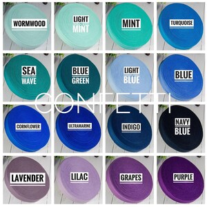 May include: A collection of 16 spools of colourful ribbon, each with a different colour and name. The colours include: wormwood, light mint, mint, turquoise, sea wave, blue green, light blue, blue, cornflower, ultramarine, indigo, navy blue, lavender, lilac, grapes, and purple.