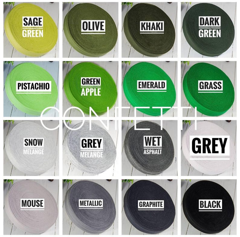 May include: A collection of 16 different coloured fabric rolls, each with a different colour and name. The colours include sage green, olive, khaki, dark green, pistachio, green apple, emerald, grass, snow melange, grey melange, wet asphalt, grey, mouse, metallic, graphite, and black.