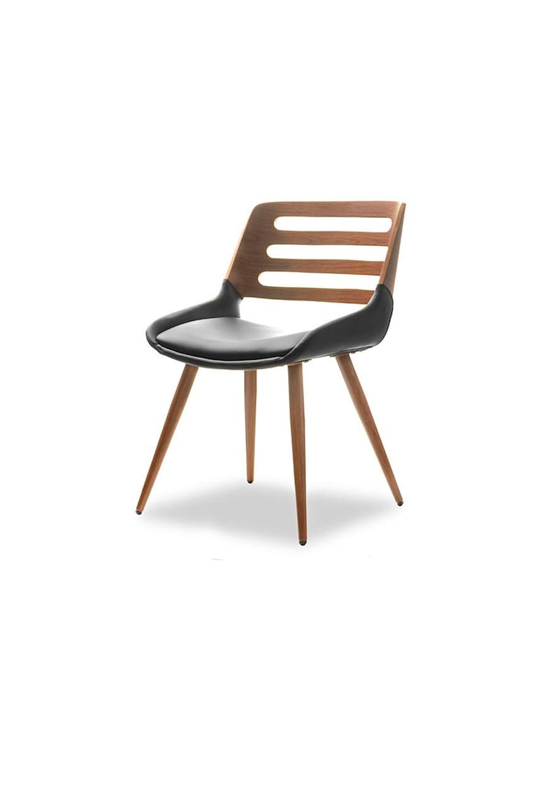 May include: A black leather chair with a wooden frame and a slatted back. The chair has four legs and a curved seat.