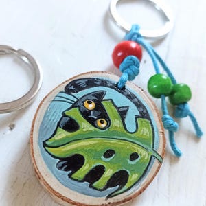 Hand-Painted Wooden Keychain, Bag Charm - Funny Black Cat and Monstera (1pc, green beads)