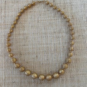 Monet textured goldtone beaded necklace