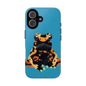 May include: A teal phone case featuring a colorful illustration of a frog. The frog has a black body with orange and yellow markings and green feet. The phone case has a dual-lens camera and black buttons on the side.