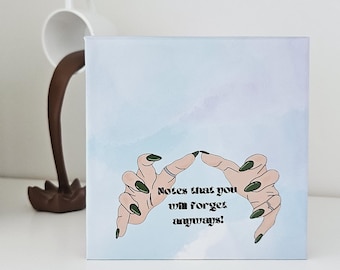 May include: A square canvas print with a light blue watercolor background featuring an illustration of two hands with long dark green nails touching at the fingertips. The text in the center reads, Notes that you will forget anyways!