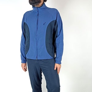Combinaison de jogging à rayures et à glands