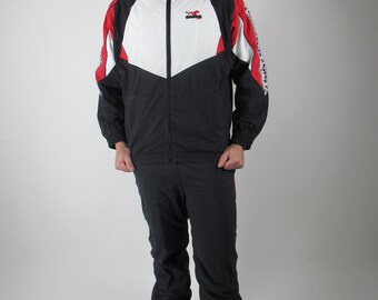 Tuta asics triacetato clearance