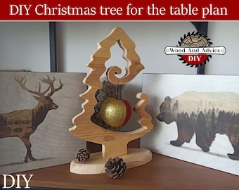 May include: DIY Christmas tree made of wood with a cutout design. The tree is decorated with a gold ornament and pine cones. The image also includes a sign that says "Wood And Advice DIY".
