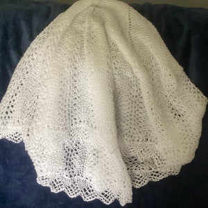 Beautiful round hand knitted baby shawl