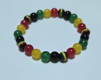 Pulsera elástica de cuentas negras, rojas, amarillas y verdes para hombre y mujer, joyería de inspiración rasta, regalo unisex.