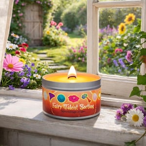 May include: A white ceramic mug with a black handle and the text "But First, Coffee" in a black, handwritten-style font. The mug is on a white surface.