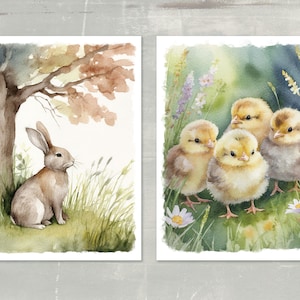 May include: Watercolor prints featuring spring scenes. One print shows a brown rabbit under a tree. The other print depicts four fluffy yellow chicks in a field of wildflowers. The artwork has a soft, pastel color palette.