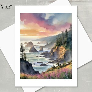 A watercolor of the sun setting over the rocky Oregon coastline.  The sky is a blend of pink, purple, and orange hues. Dark green evergreen trees line the cliffs.  The ocean is a calm blue-green.  Wildflowers in shades of pink and purple are in the foreground. The card measures 4.25" x 5.5".