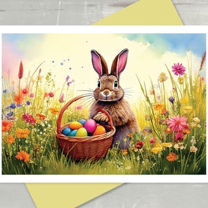 May include: Watercolor illustration of an Easter bunny holding a basket of colorful eggs in a field of wildflowers. The bunny is brown with long ears, and the basket is woven.