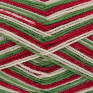 Puede incluir: Un ovillo de lana con rayas rojas, blancas y verdes. La lana es de lana y es perfecta para tejer o hacer ganchillo.