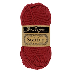 May include: A ball of red yarn labelled "Scheepjes Softfun" on a brown label.