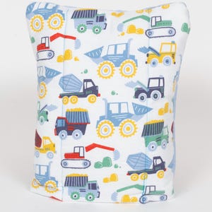 May include: White pillowcase with a repeating pattern of colorful construction vehicles, including dump trucks, excavators, and cement mixers.