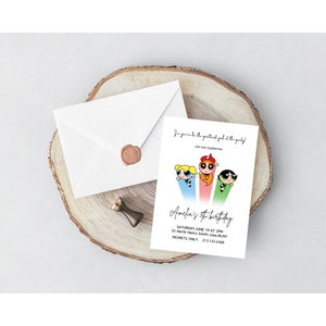 May include: A pink, blue, green, and red invitation card with a cartoon image of the Powerpuff Girls. The text on the card reads "I'm gonna be the prettiest girl at the party!" and "Amelia's 5th birthday".