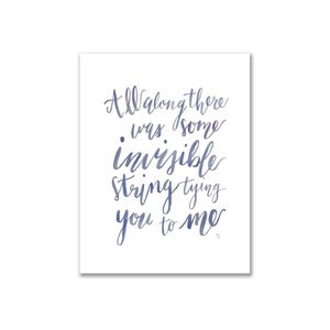 May include: A watercolor illustration with a blue and purple gradient of the text "All along there was some invisible string tying you to me."