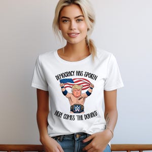 Funny Trump Political Tee, Unisex Softstyle T-Shirt, Democracy Has Spoken, MAGA Apparel Gifts for Friends and Family, Here Comes the Donald,