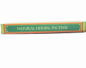 May include: A green and orange box with the text "NATURAL HERBAL INCENSE" printed on it. The box has a gold border with a Greek key design.