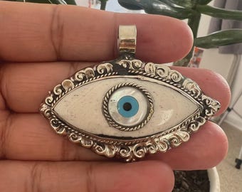 Bone Craved Evil eye with Tibetan repousse silver, Handcrafted, 1.25x2.25 inches (P-59)
