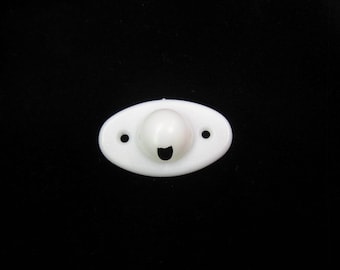 White knot holder/covers for spring operated roller blinds