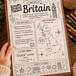 May include: A monochrome illustrated guide to Britain on a wooden clipboard. It features a map, the Union Jack, Big Ben, and the text "Welcome to Britain." The design includes fun facts and a Welsh word. Held by a person.