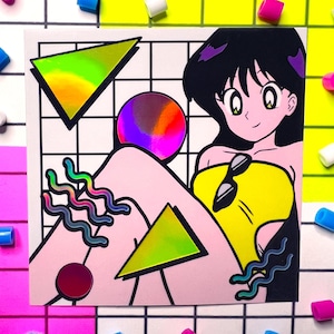 Puede incluir: Una pegatina colorida con un personaje de estilo anime con una parte superior amarilla, cabello negro y gafas de sol. El diseño incluye formas geométricas con efectos holográficos e iridiscentes, sobre un fondo de cuadrícula.