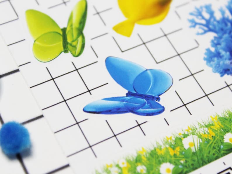 Snap shot of butterfly stickers that come on a Frutiger Aero sticker sheet. Decorate planners or journal pages.